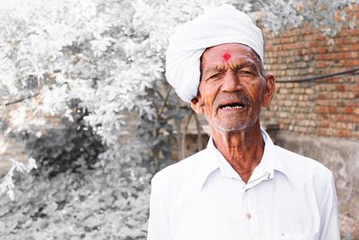 Portrait of senior man wearing turban outdoors