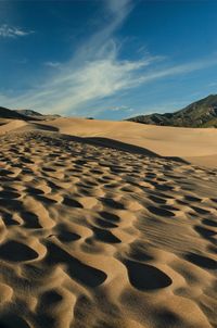 Scenic view of desert against sky