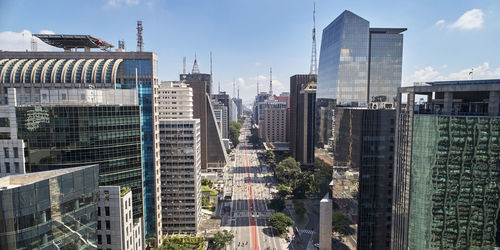 Buildings in city against sky