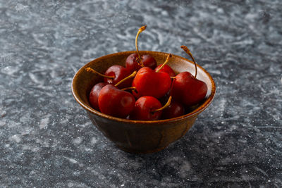 High angle view of cherries in bowl