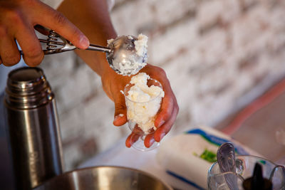 Close-up of person preparing food