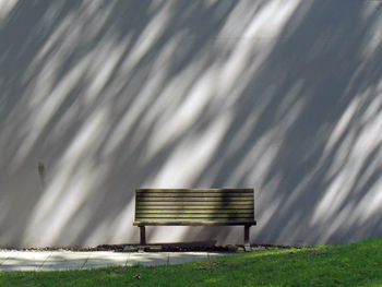 View of bench against wall