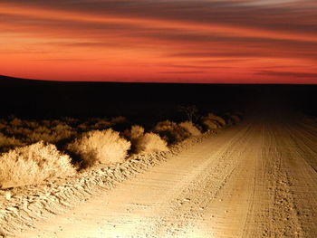 Scenic view of landscape against sky during sunset