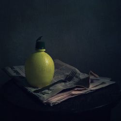 Close-up of fruits over black background