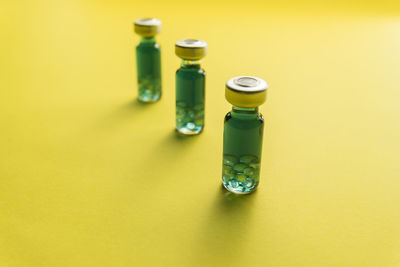 High angle view of bottles on table