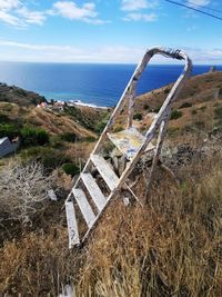 High angle view of sea shore against sky