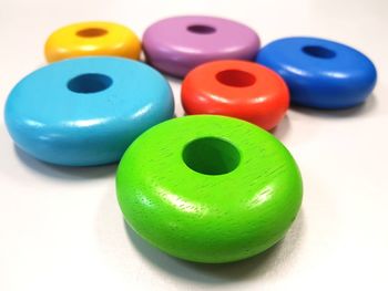 Close-up of multi colored balls on table