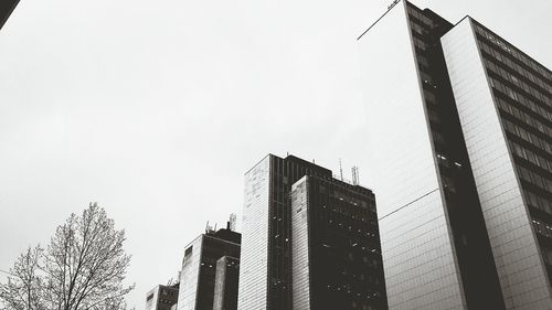 Low angle view of skyscraper against clear sky