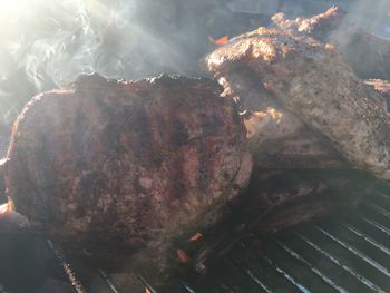 Close-up of meat on barbecue grill