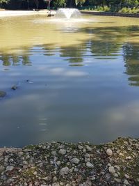 Reflection of rocks in lake