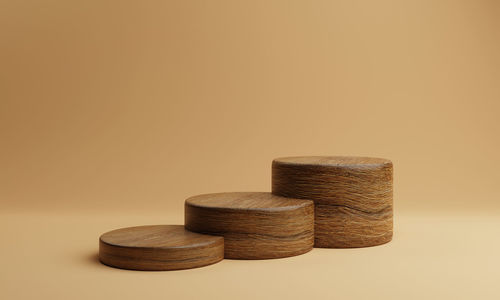 Close-up of stack of wood against white background