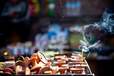 Close-up of burning incense sticks