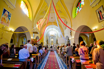 Group of people in illuminated building