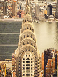 High angle view of illuminated buildings in city at night