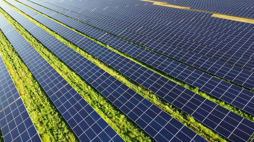 Aerial drone view flight over solar power station panels. aerial top view of solar farm. 