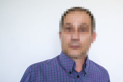 Digital composite image of man against white background