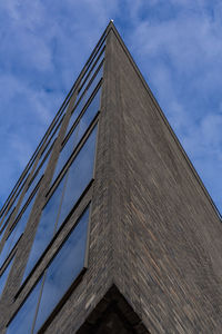 Low angle view of modern building against sky