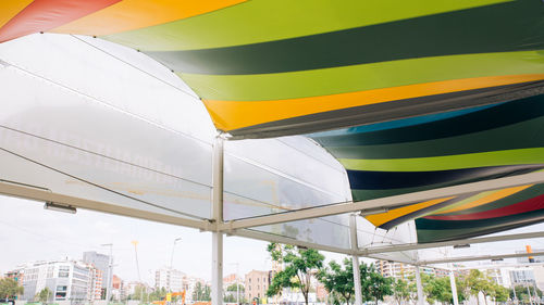 Low angle view of multi colored awnings