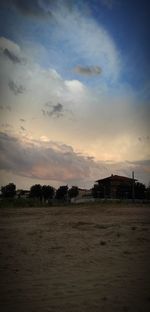 Scenic view of field against sky during sunset