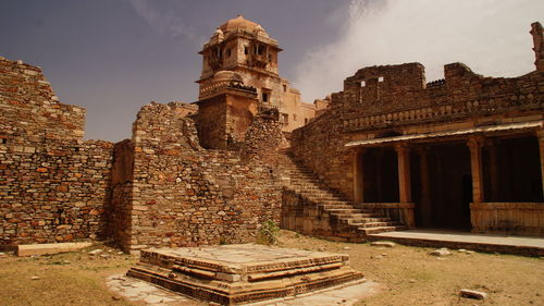 Historic abandoned building at chittorgarh district against sky