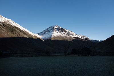 Scenic view of mountains against clear sky