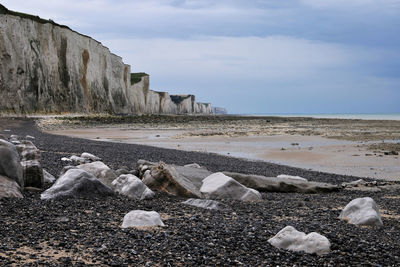 Scenic view of beach against sky