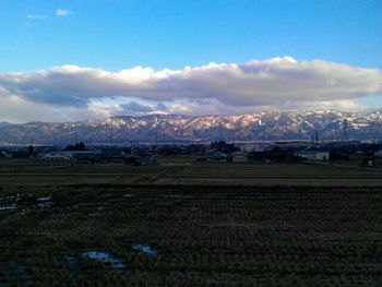 Scenic view of field against sky