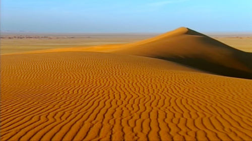 Scenic view of desert against sky