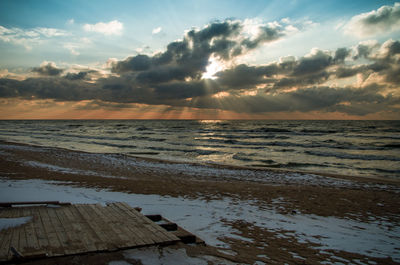 Scenic view of sea against sky during sunset