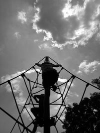 Low angle view of silhouette tree against sky