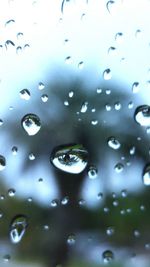 Close-up of water drops on glass