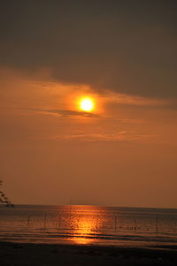 View of calm sea at sunset