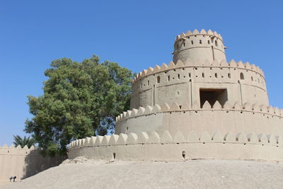 Low angle view of historical building against clear sky