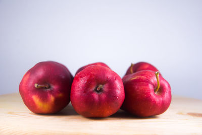 Close-up of apples on table