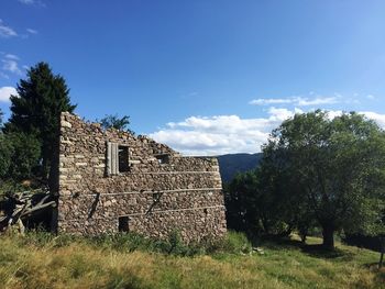 Built structure against cloudy sky