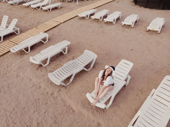 High angle view of woman reading book