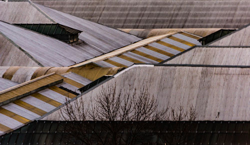 Tilt image of barn against sky