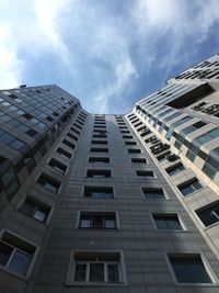 Low angle view of modern buildings against sky