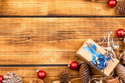 View of christmas decorations on wooden table