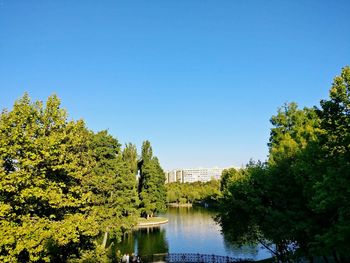 Bridge over river against clear sky