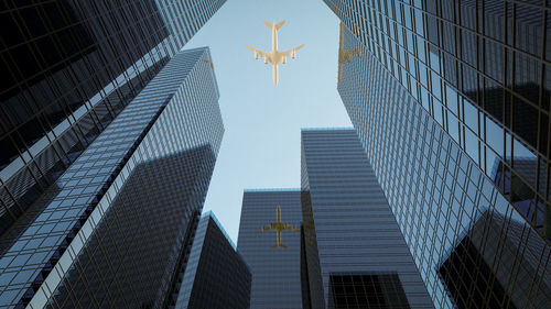 Low angle view of modern buildings against clear sky