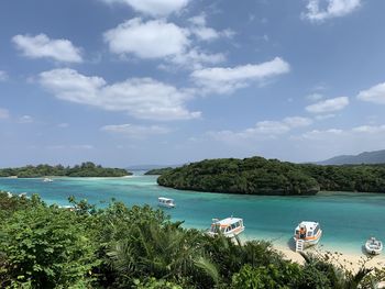 Scenic view of bay against sky