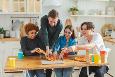 Female friends working at home