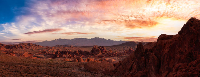 Scenic view of mountains against sky during sunset