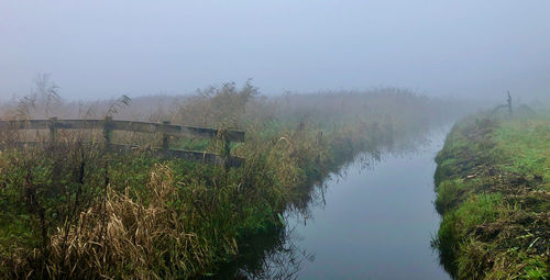 Scenic view of land against sky