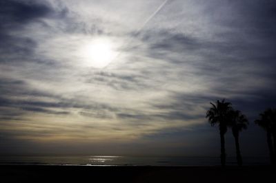 Scenic view of sea against sky at sunset