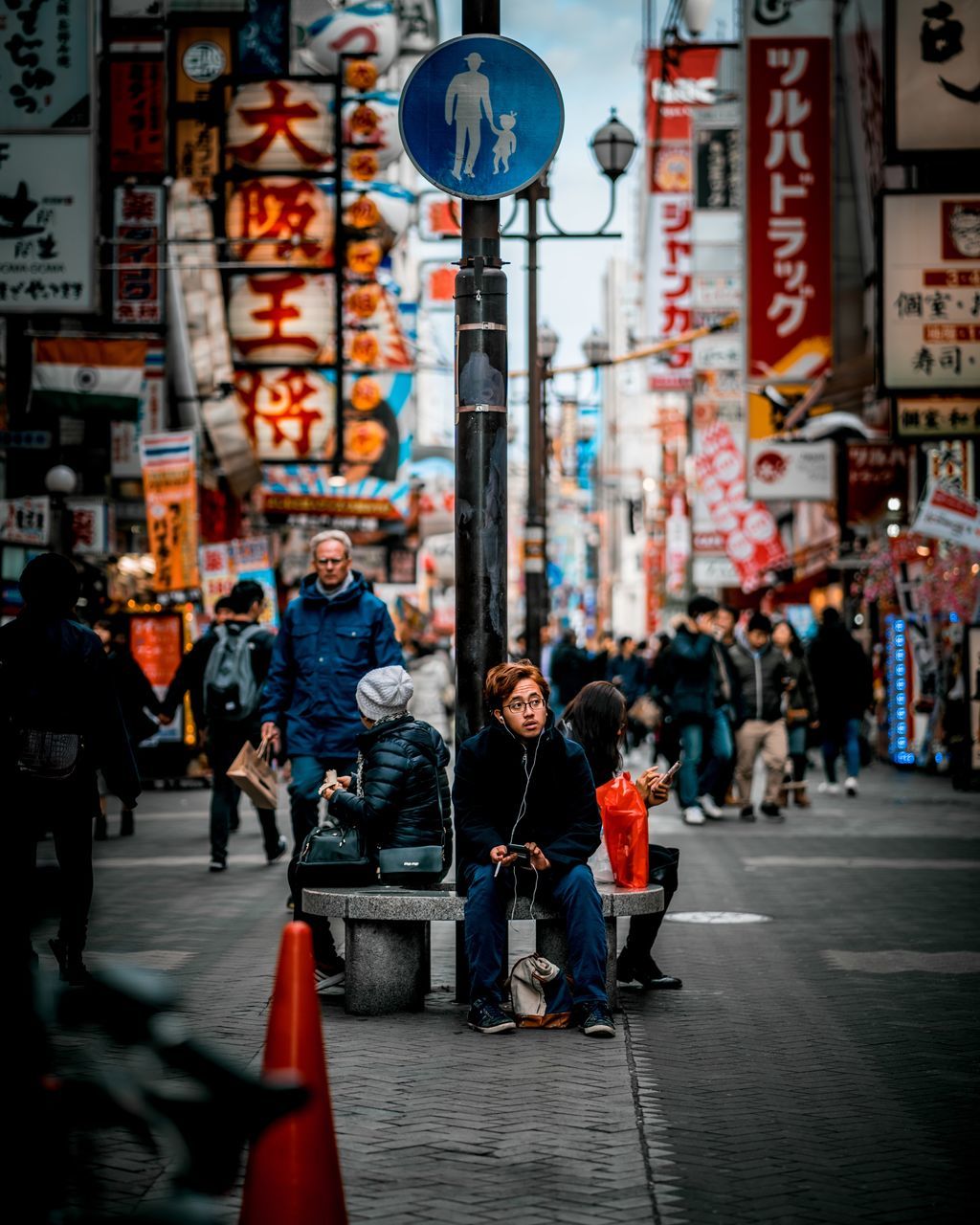 city, architecture, street, real people, building exterior, built structure, group of people, city life, people, adult, lifestyles, crowd, men, city street, incidental people, women, walking, transportation, communication, road, outdoors