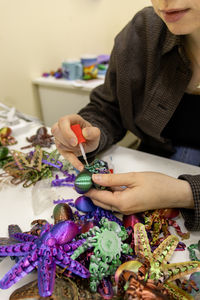 Midsection of woman preparing food at home