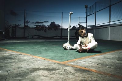 Man playing with ball in park