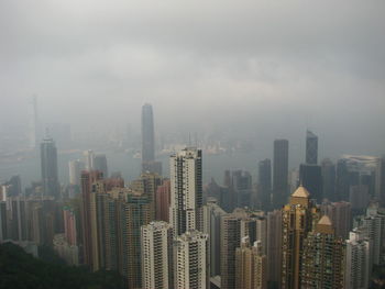 Skyscrapers in city against sky